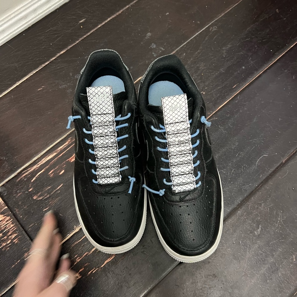 Black af1 with blue and a reflective strip.